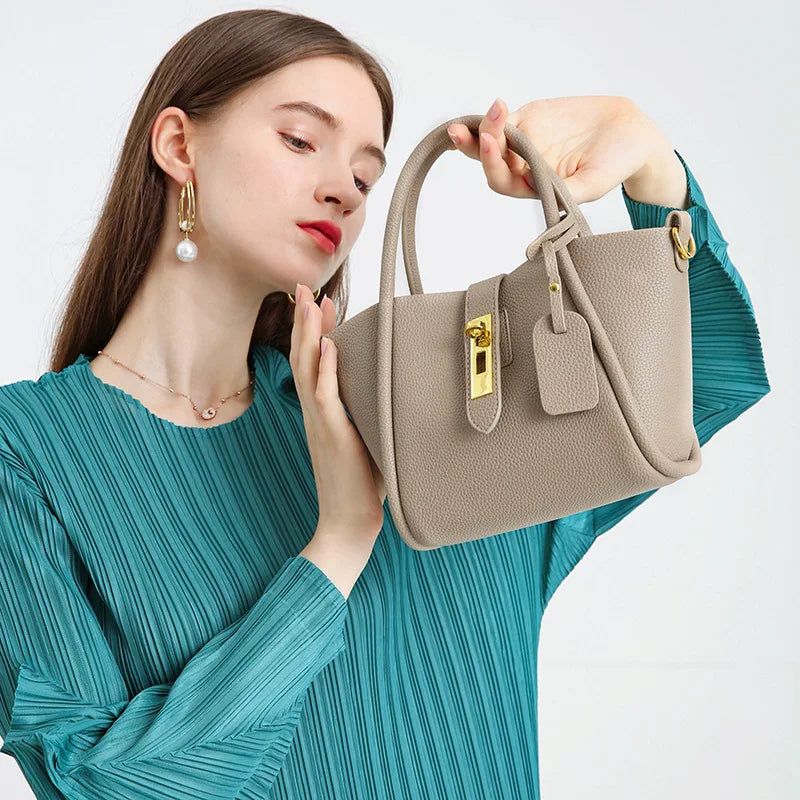 Alina | Borsa a mano in pelle con chiusura girevole