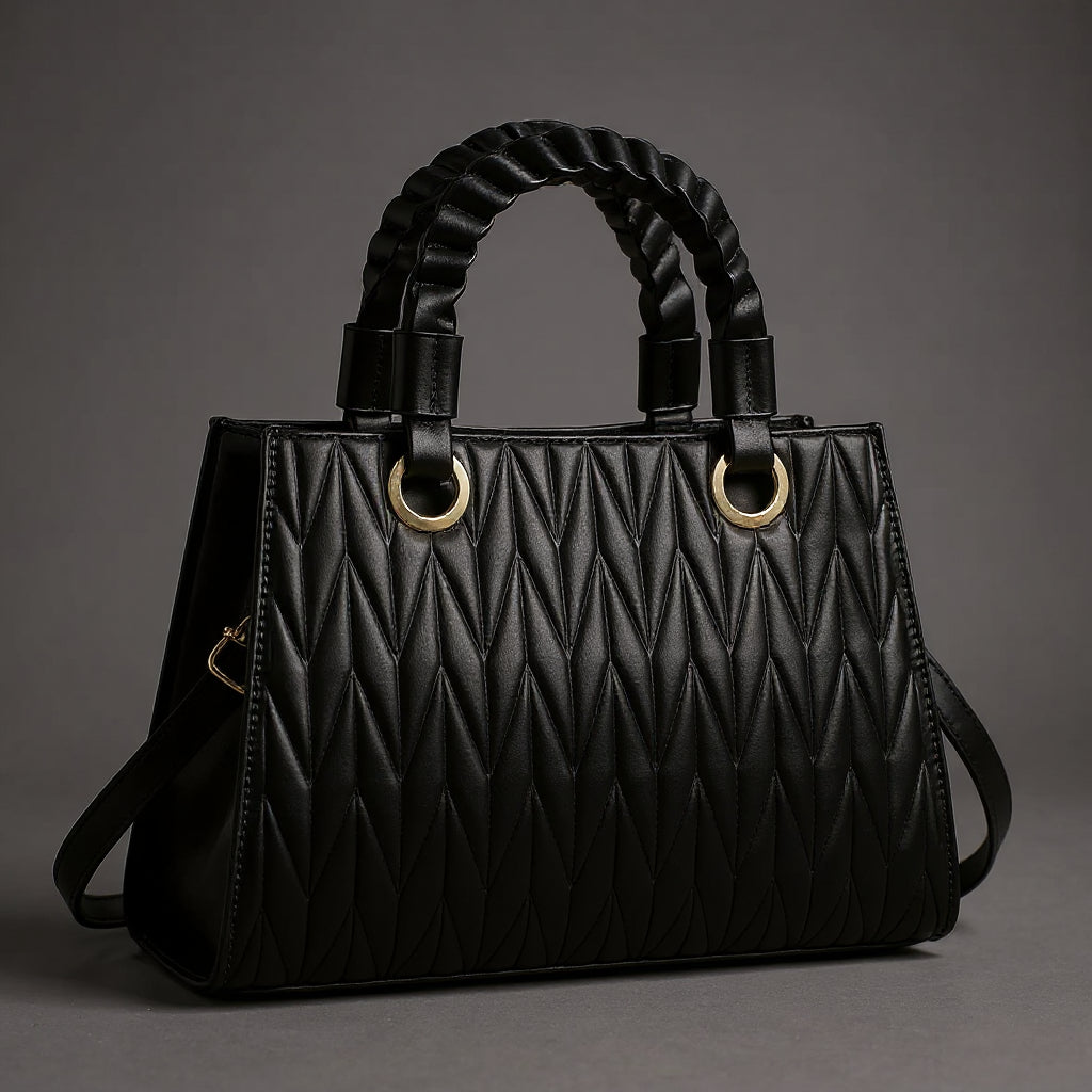 Madeleine | Borsa trapuntata con manici intrecciati