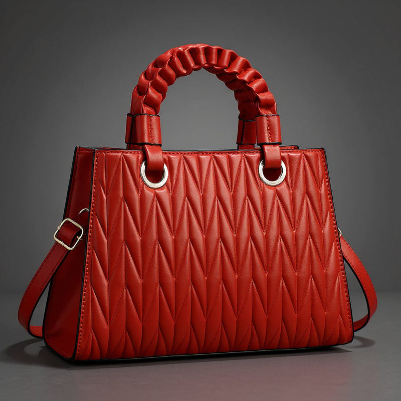 Madeleine | Borsa trapuntata con manici intrecciati